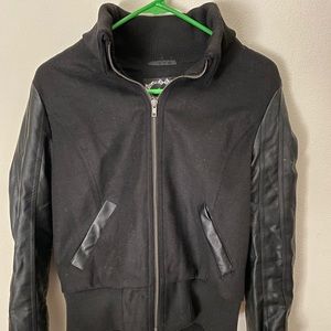 black jacket with leather sleeves
